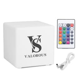 A large white colour cube with a logo, accompanied by a remote control and a charging cable.