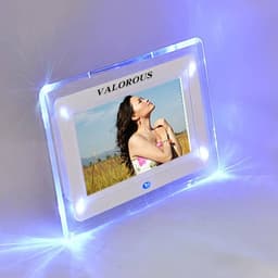 A 7-inch acrylic LED digital photo frame with blue lighting, displaying a portrait of a woman outdoors.