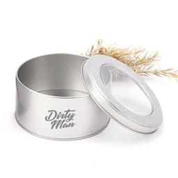 A round silver metal tin canister with a clear window top lid and a logo design.