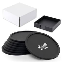 A set of black round silicone coasters stacked beside an open black box and a white square box.