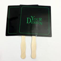 A set of two black hand fans with wooden handles, featuring green text areas for custom designs.