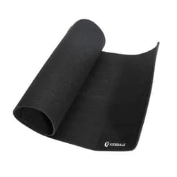 A large black felt desk pad is rolled slightly open, featuring a small logo on the corner.