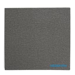 A grey laptop stand with an attached mouse pad, featuring a logo in the corner.