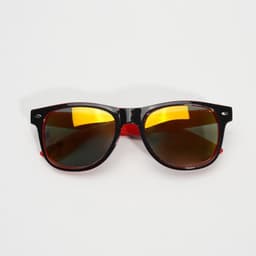 PC Classic Sunglasses feature a black frame with red accents and yellow-tinted lenses. The design is retro-inspired.