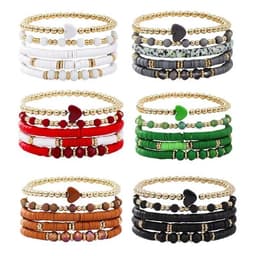 A display of colourful clay bead stretch stacking bracelets in various combinations, featuring gold accents and heart shapes.