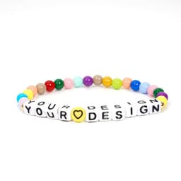 A set of three clay bead bracelets featuring colourful beads and personalised letter beads.