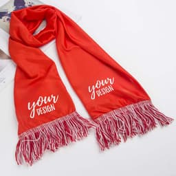 A bright red custom sports fan scarf with white fringes and space for personalised design.