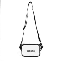 A clear PVC cross body bag with black trim and an adjustable strap. It features a blank area for custom designs.