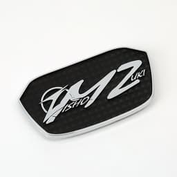 A personalised car emblem featuring a black background with silver accents and a logo.