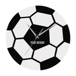 A round wall clock designed to resemble a soccer ball, featuring a black and white pattern and simple clock hands.