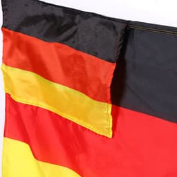 A flag featuring horizontal stripes in red, black, and yellow, with a fabric texture and a logo in one corner.