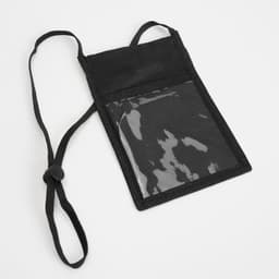 A black neck pouch with a transparent front pocket and adjustable cord for easy carrying. Features a logo.