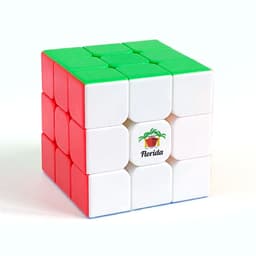 A 3x3x3 magnetic speed cube featuring green, red, and white sides, with a logo on one face.