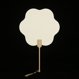 A custom bamboo hand fan in a flower shape, featuring a wooden handle and a decorative tassel, with a cream colour.