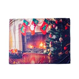 A decorative backdrop cloth featuring a festive scene with a fireplace, Christmas stockings, and a decorated tree, in vibrant colours.