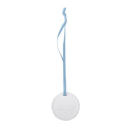 A round ceramic aroma diffuser stone in white, hanging from a light blue ribbon.