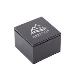 A black custom PU flip gift box featuring a logo on the top. The box is square-shaped with a smooth finish.
