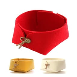 A red felt desktop organiser with two smaller containers in yellow and white, featuring a leather tie detail.
