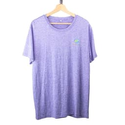 A purple short sleeve T-shirt hanging on a wooden hanger, featuring a small logo.