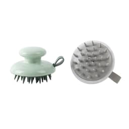 A silicone scalp shampoo brush with a handle, featuring a mint green top and grey bristles.