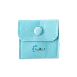 A small turquoise jewellery storage bag with a button closure and a logo on the front.