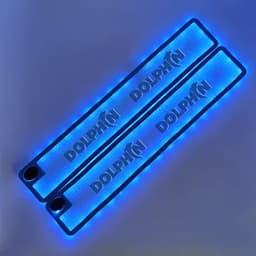 Custom waterproof rubber bar mat in blue with a decorative design, featuring a logo and a sleek, illuminated edge.