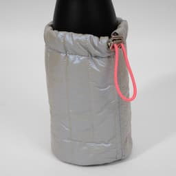 A drink bottle holder bag in shiny silver with a pink drawstring, designed for insulation and protection.