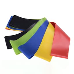 A set of resistance loop bands in red, yellow, green, blue, and black, arranged in a casual pile, including a carrying bag.