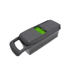 A multifunctional kitchen slicer in grey with a green accent, featuring a handle for easy use and a compartment for slicing.
