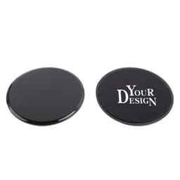 Two black exercise gliding discs, one side matte and the other with a printed design placeholder and a logo.