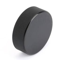 A black rubber ice hockey puck with a textured surface, featuring a logo.