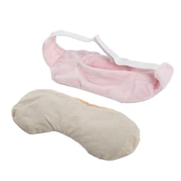 A pink flaxseed eye mask with a removable beige lining and an adjustable strap for comfort.