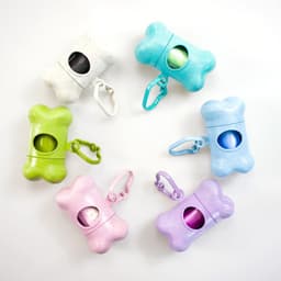 A set of six bone-shaped dog poop bag holders in colours including green, blue, pink, and purple, with clips and openings.