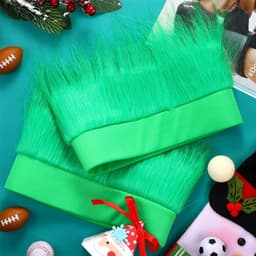 A bright green fan wig with a wide headband, featuring fluffy green hair and a decorative ribbon.
