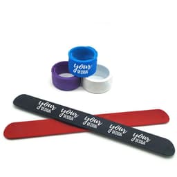 Personalised silicone slap bracelets in red, black, and white, with additional silicone bands in blue and purple.
