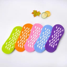 Five pairs of non-slip yoga socks in green, orange, pink, purple, and light blue with grip patterns are displayed.