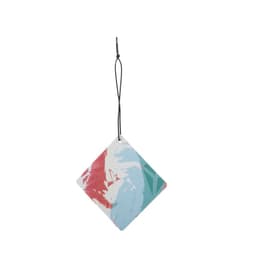 A hanging aromatherapy paper car freshener in a diamond shape with a colourful abstract design in pastel shades.