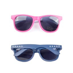Two pairs of sunglasses: one in bright pink and the other in navy blue, both with dark lenses and branding.