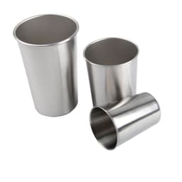 A set of three stainless steel pint cups in various sizes, featuring a sleek metallic finish and a minimalist design.