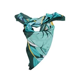 A satin square scarf featuring a colourful leaf design in shades of teal, green, and yellow with a branding logo.