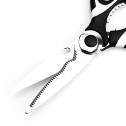 A pair of multifunctional food scissors in black and white with serrated edges for various cutting tasks.