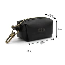 A black PU leather dog poop bag holder with a zip closure and a clip, featuring dimensions and weight details.