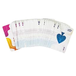 A fan of playing cards with a mix of coloured designs, featuring a prominent blue heart on the Ace card.