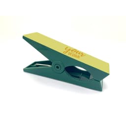 A green windproof cloth clip with a yellow top for personalised designs. Features a branding logo.