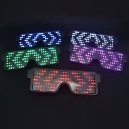 Dynamic LED glasses in various colours including purple, blue, green, and red, arranged on a black background.