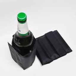 A drink bottle wrapped in a black gel wine cooler, with additional pads displayed nearby.