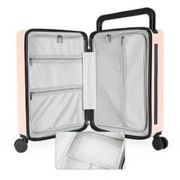 A wheeled luggage bag in soft pink with a black handle, featuring multiple interior compartments and a zippered section.