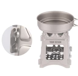 A portable fire pit in a silver finish with a sturdy base and a bowl top, featuring a design area.