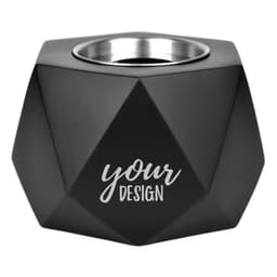 A black portable mini fire pit with a geometric design and a space for custom branding.