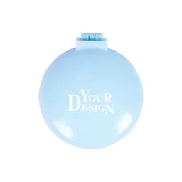 A light blue plastic folding massage comb with a mirror, featuring a logo on the front.